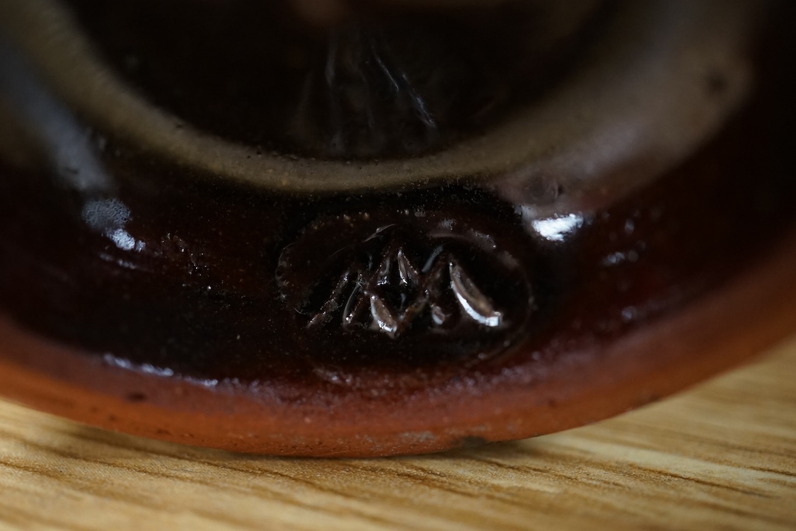 A collection of studio pottery to include a Celtic pottery Newlyn goblet, various jugs and bowls, largest 19cm high